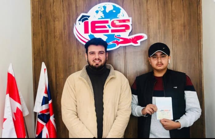 IES Immigration client celebrating visa success