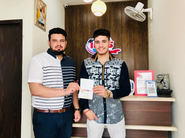 IES Immigration client celebrating visa success